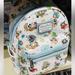 Disney Bags | Loungefly Disney Runaway Railway Backpack | Color: Silver | Size: Os