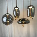 Lampe suspendue en verre au design scandinave BROKIS Knot design nordique Luminaire décoratif
