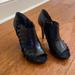 Nine West Shoes | Black Leather Peep Toe Booties With Crisscross Sides. Size 7.5 | Color: Black | Size: 7.5