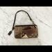 Coach Bags | Coach Animal Print Patchwork Madison Wristlet | Color: Brown/Gold | Size: 7in X 3.75 In