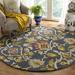 Blue 84 x 0.47 in Area Rug - Langley Street® Ferrera Handmade Tufted Wool Navy Multi Rug Wool | 84 W x 0.47 D in | Wayfair