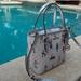 Michael Kors Bags | Michael Kors Jet Set Girls Xs Convertible Satchel Bright White | Color: Silver/White | Size: Xs