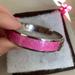 Coach Jewelry | Coach Bangle Bracelet - Silver/Pink - Os | Color: Pink/Silver | Size: Os