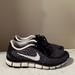 Nike Shoes | Nike Free 5.0 Sneakers | Color: Black/White | Size: 8.5