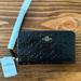 Coach Bags | Coach Large Phone Wallet In Signature Leather - Nwt | Color: Black | Size: Os