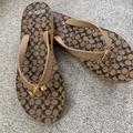 Coach Shoes | Coach Nib Thong Sandals. Size 8. Cinnamon Brown With Classic Coach Black Logo | Color: Brown | Size: 8