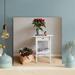 Latitude Run® Poinsettia Flowers On Top Of White Wooden End Table & Berries Wreath On Basket | 12 H x 12 W x 2 D in | Wayfair