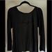 Victoria's Secret Tops | Euc Victoria’s Secret Long Sleeve T Shirt, Open Back Angel Logo On Front | Color: Black | Size: L