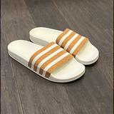 Adidas Shoes | Adidas Adilette Slides Sandals Shoes White Cork New Cq2238 Women’s Flip Flops | Color: Tan/White | Size: Various