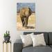Bungalow Rose Brown Elephant Walking On Brown Sand During Daytime 1 - 1 Piece Rectangle Graphic Art Print On Wrapped Canvas in Blue/Brown | Wayfair