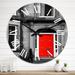 Designart 'Red Door In Black And White City House' Colonial wall clock