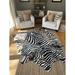 Black/White 84 x 84 x 0.75 in Area Rug - Cowhides USA Handmade Augusto Zebra Pattern Cowhide Rug Cowhide | 84 H x 84 W x 0.75 D in | Wayfair