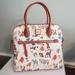 Dooney & Bourke Bags | Disney Parks Dogs Dooney And Bourke Holiday Santa Tails Satchel | Color: Pink/Tan | Size: Os