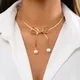 Ingemark – collier ras du cou élégant avec nœud papillon pour femme et fille chaîne de clavicule de