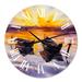 Designart 'Sunset and Two Small Boats Parking On The Shore' Lake House wall clock