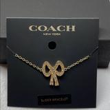 Coach Jewelry | Coach Bracelet Pink Gold Pave Crystal Bow Slider Bracelet New | Color: Pink/Silver | Size: Os