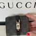 Gucci Bags | Gucci Gg Monogram Canvas & Leather Compact Wallet | Color: Black/Gray | Size: Os