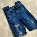 American Eagle Outfitters Jeans | Aeo American Eagle Super High Rise Jegging Dark Washed Distressed | Color: Blue | Size: 00