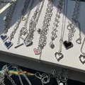 Pendentif d'amour creux irrégulier Double couche chaîne de perle collier en métal pour femmes et