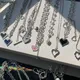 Pendentif d'amour creux irrégulier Double couche chaîne de perle collier en métal pour femmes et