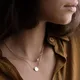 Collier de pièces de monnaie superposées pour femmes bijoux en perles faits à la main tour de cou