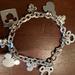 Disney Jewelry | Disney Mickey Mouse Heads Carm Bracelet | Color: Silver | Size: Os