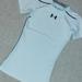 Under Armour Shirts & Tops | 2/$20- Under Armour Short Sleeved Fitted Compression Shirt | Color: White | Size: Xsb