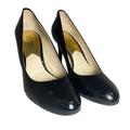 Michael Kors Shoes | Michael Kors Black Flex Pump Size 7.5 | Color: Black/Gold | Size: 7.5