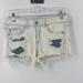 American Eagle Outfitters Shorts | American Eagle Creamy White With Blue Wash Distressed Jean Shortie Shorts Size 6 | Color: Blue/Cream/Red/Tan/White | Size: 6