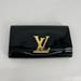Louis Vuitton Bags | Black Louis Vuitton Louise Clutch | Color: Black | Size: Os