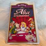 Disney Media | Disney, Alice In Wonderland, Vhs Movie | Color: Pink/Red | Size: Vhs