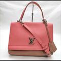 Louis Vuitton Bags | . Louis Vuitton Lv Shoulder Bag Lockme Pinks Leather 414736 | Color: Pink | Size: 7.8” X 11.8” X 3.9”