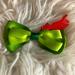 Disney Accessories | Disney Bow Hair Clip | Peter Pan | Color: Green/Red | Size: Os