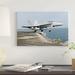 East Urban Home 'An F/A-18C Hornet Launches from the Aircraft Carrier USS Harry S. Truman' Photographic Print on Canvas in Blue/Green/White | Wayfair