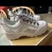 Michael Kors Shoes | Michael Kors White Swade, Silver Detailing. Size 9 | Color: White | Size: 9