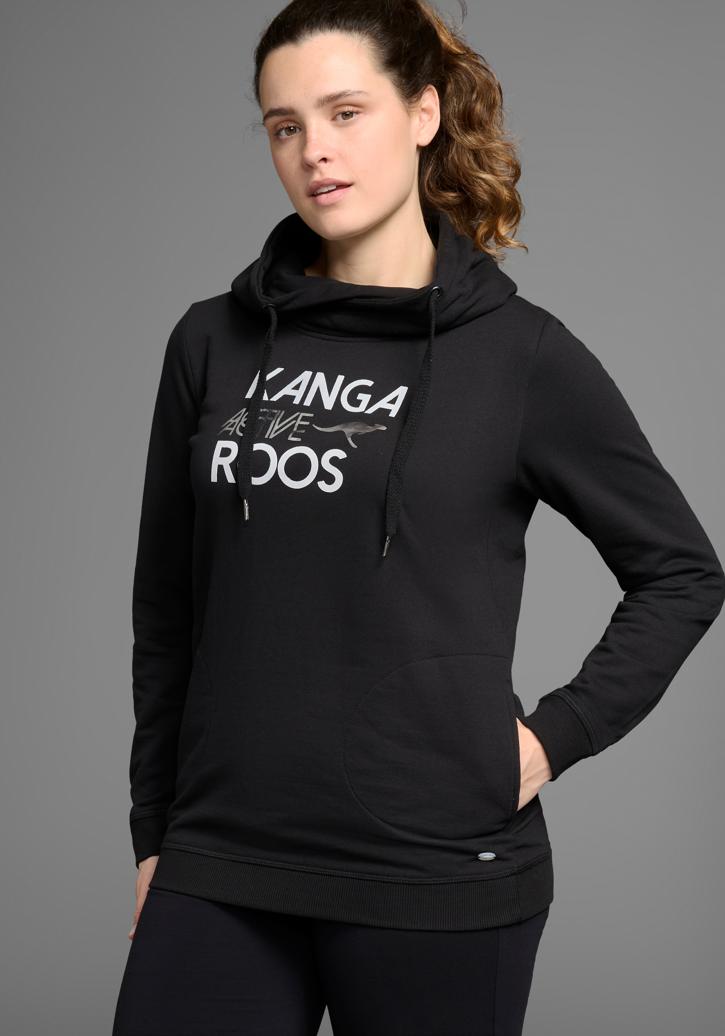 Sweatshirt KANGAROOS, Damen, Gr. 52/54, schwarz, Obermaterial: 65% Baumwolle, 35% Polyester, figurumspielend lang, Sweatshirts Sweatshirt, lange Ärmel, figurumspielende Passform, große Größen