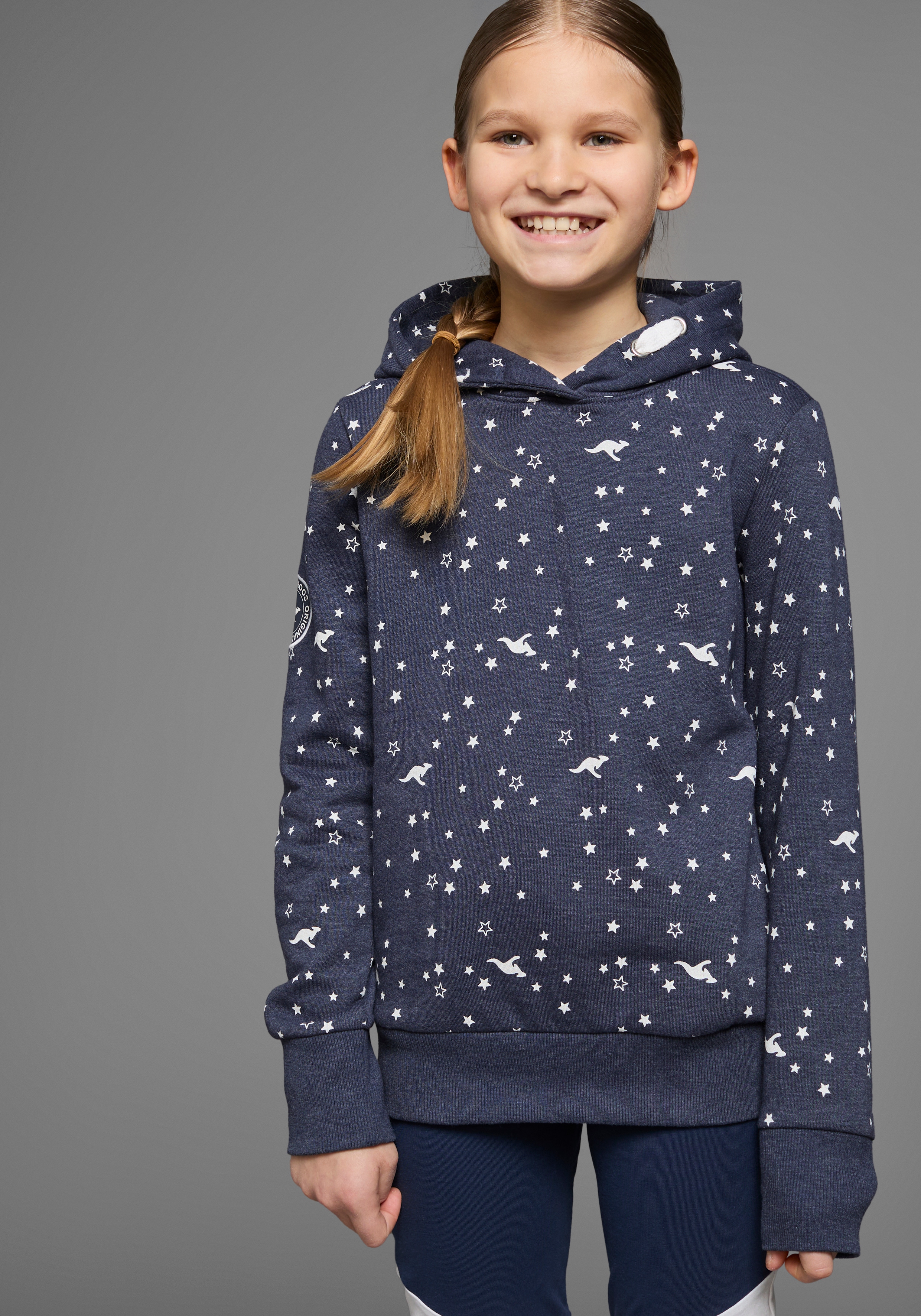 Kapuzensweatshirt KANGAROOS, Mädchen, Gr. 128/134, blau (marine, meliert), angeraute Sweatware, Obermaterial: 60% Baumwolle, 40% Polyester, bedruckt, Basic hüftlang, Bündchen, Sweatshirts, Langarm, bedruckt, mit Kapuze, aus Baumwollmischung Image
