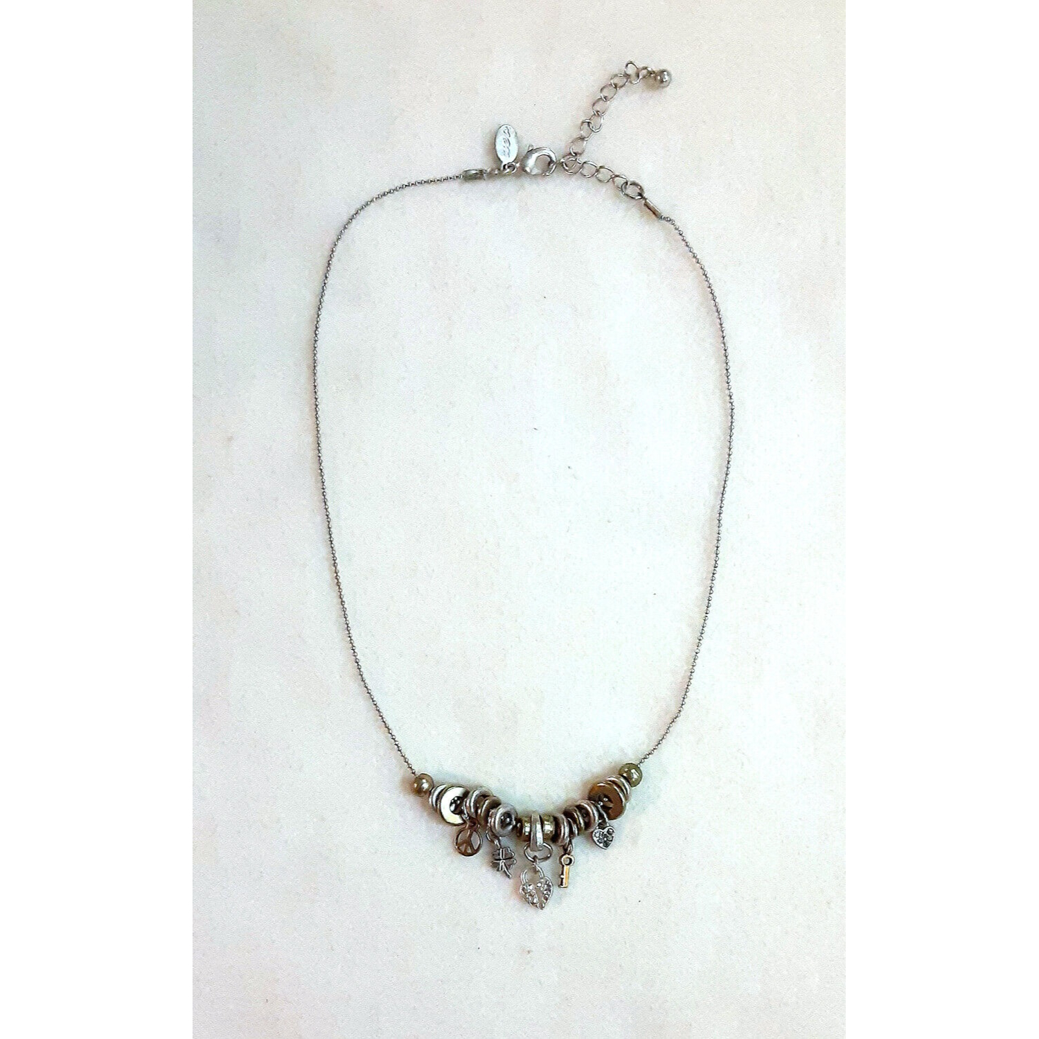 American Eagle Outfitters Jewelry | Aeo American Eagle Charm Necklace - 5 Charms - Lock Key Heart Clover Peace Sign | Color: Gold/Silver | Size: Os