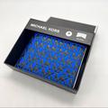 Michael Kors Bags | Michael Kors Greyson Logo Embossed Leather Billfold Wallet | Color: Black/Blue | Size: Os