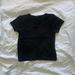 Brandy Melville Tops | Brandy Melville Baby Tee Black | Color: Black | Size: One Size