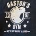 Disney Tops | Gaston’s Gym White Version Racerback Tank Top | Color: Black/White | Size: M