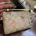 Coach Bags | Authentic Coach Signature Coated Leather Veggie Floral Zip Top Wristlet | Color: Tan/Yellow | Size: 6 1/4" (L) X 4" (H) X 1/2" (W)