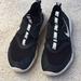 Nike Shoes | Black/White Lightweight Slip-On Nike Sneakers | Color: Black/White | Size: 5.5bb