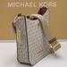 Michael Kors Bags | Michael Kors Briley Small Logo Messenger Bag Vanilla Signature Color | Color: Brown/Cream | Size: Small