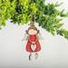 The Holiday Aisle® Angel Girl Holding a Heart Ornament Wood in Brown/Red/White | 6 H x 3.5 W x 0.5 D in | Wayfair A08E77E73B7E4C0C83330C5CDDAD9B5C