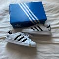 Adidas Shoes | Adidas Superstars Size 5 Women’s Nwt-Comes With Box | Color: Black/White | Size: 5