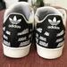 Adidas Shoes | Adidas Superstar Sneakers 3 Strip Toe Shell Shoes Size 6 Black/White/Gold. | Color: Black/White | Size: 6