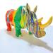 The Gears Clock Resin Rhinocerus Figurine Resin in Green/Red/Yellow | 9.05 H x 19.69 W x 7.08 D in | Wayfair IMPL_STATUE_RHINO