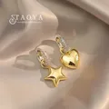 Boucles d'oreilles pendantes en forme d'étoile et de cœur pour femmes design européen et américain