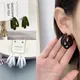 Boucles d'oreilles avec peinture en aérosol blanche verte et noire boucles d'oreilles rondes et